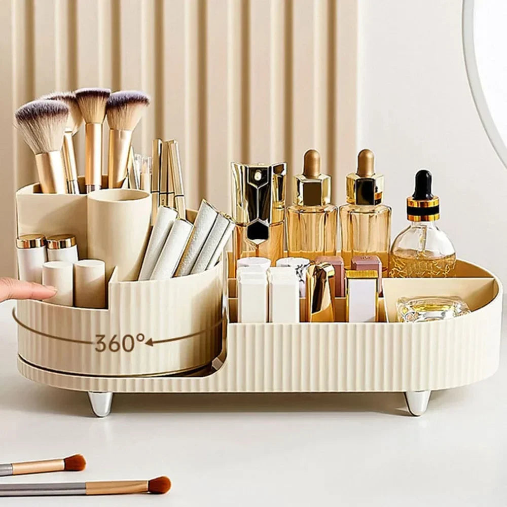 Beige rotating makeup organizer holding brushes, skincare bottles, and cosmetics on a vanity.
