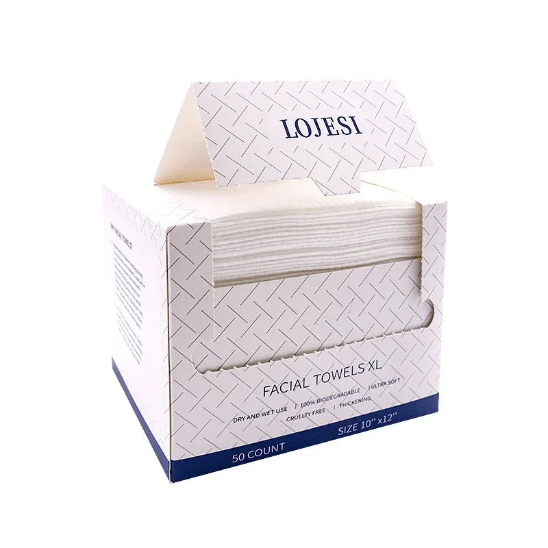 Box of XL facial towels, 50 count, biodegradable and ultra soft, partially open.