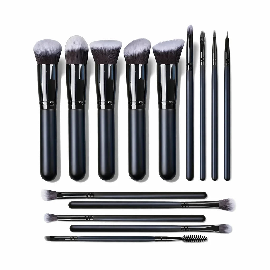 Set of black makeup brushes with soft gray bristles, arranged neatly on white background.