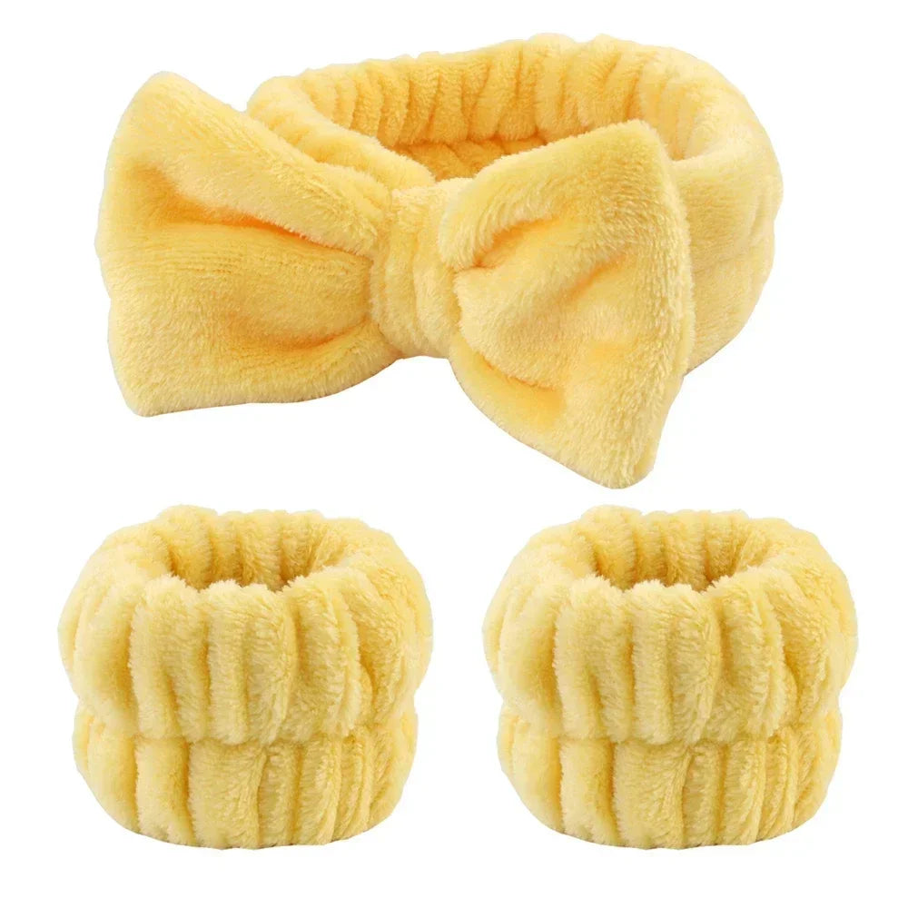 Yellow plush headband with bow and matching wristbands, soft spa accessory set