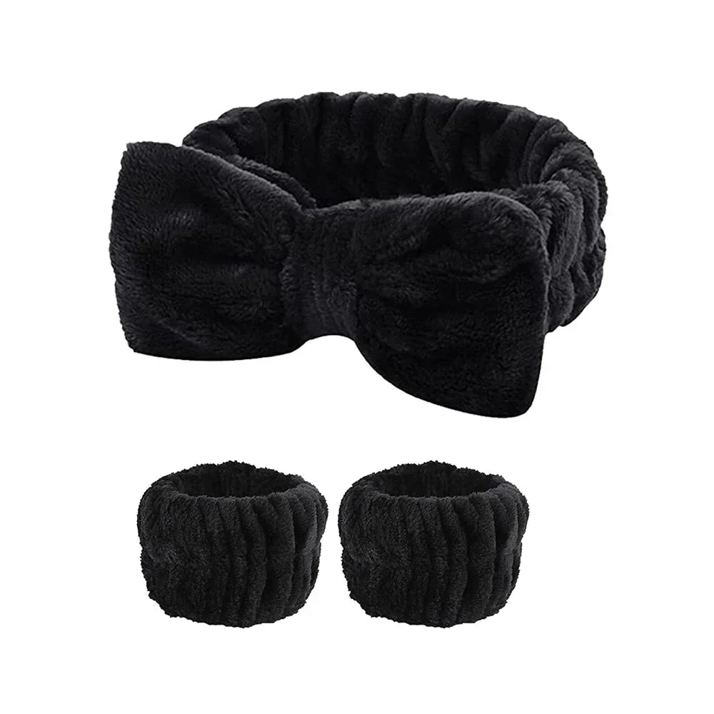 Black plush headband with bow and matching wristbands, soft spa accessories set