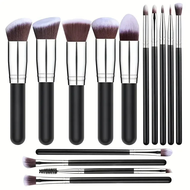 Set of professional makeup brushes with black handles and soft bristles on white background